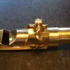 A close up of the top part of a trumpet