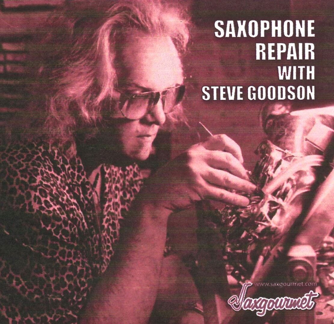 a person repairing a saxophone