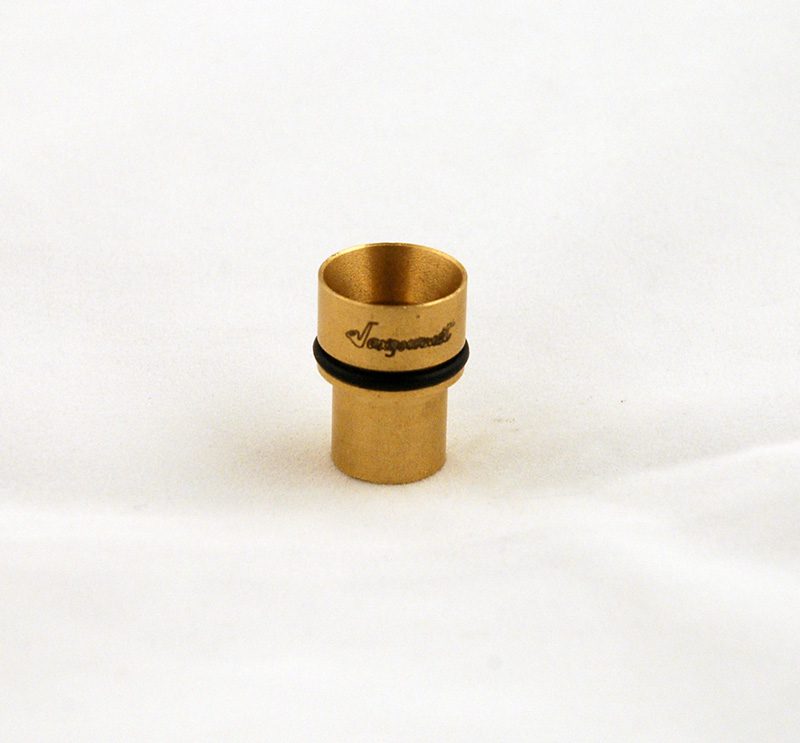 A small gold cup with a black handle.